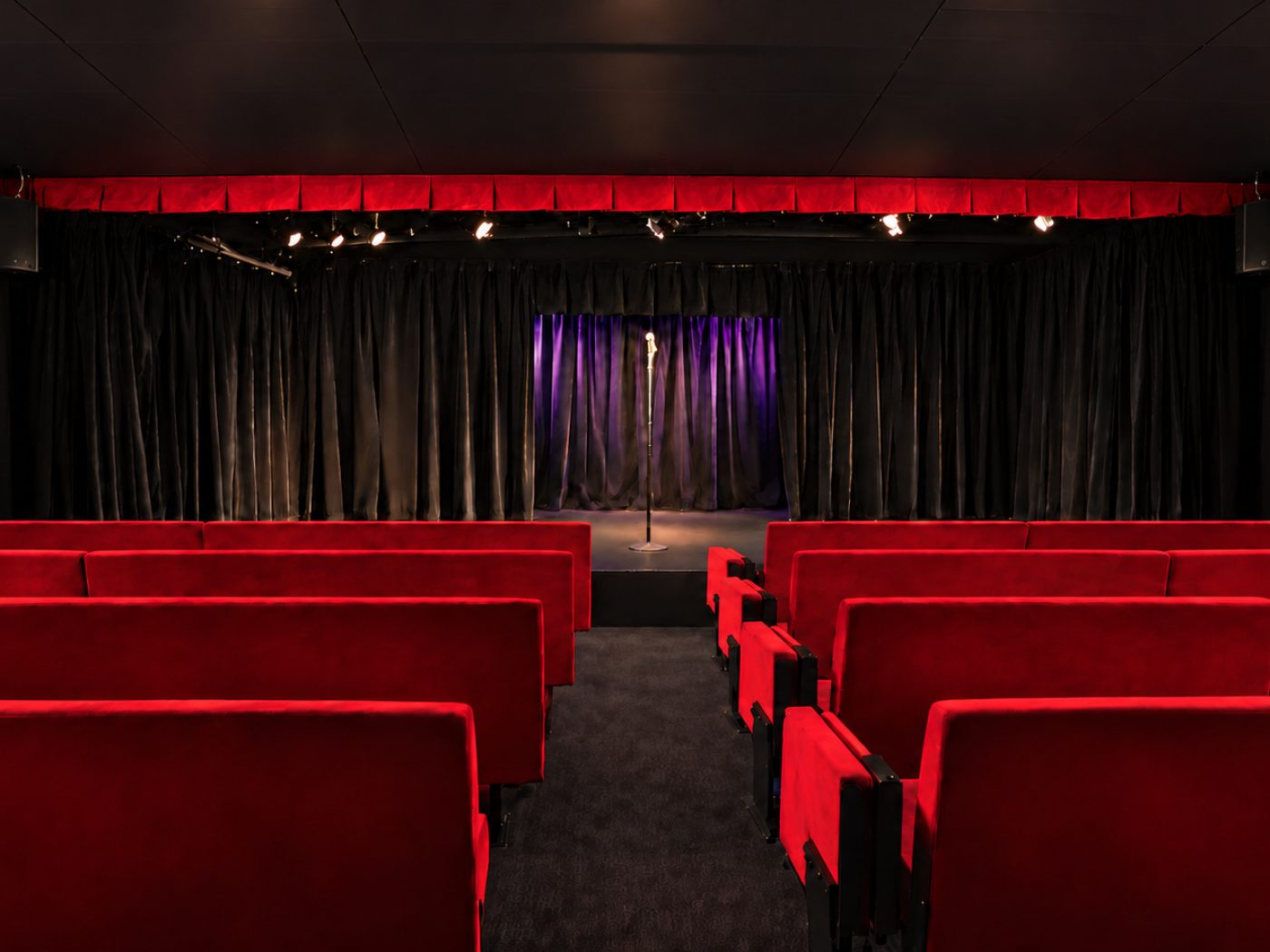 The auditorium and stage curtain at Le Métropole